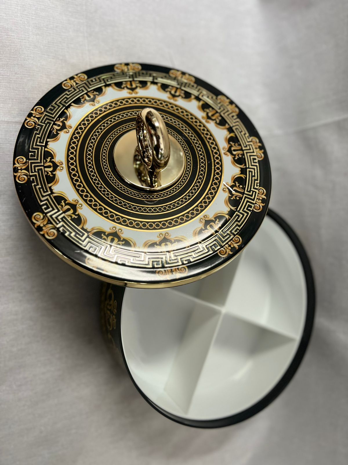 Elegant Black & Gold Round Decorative Box with Ornate Detailing